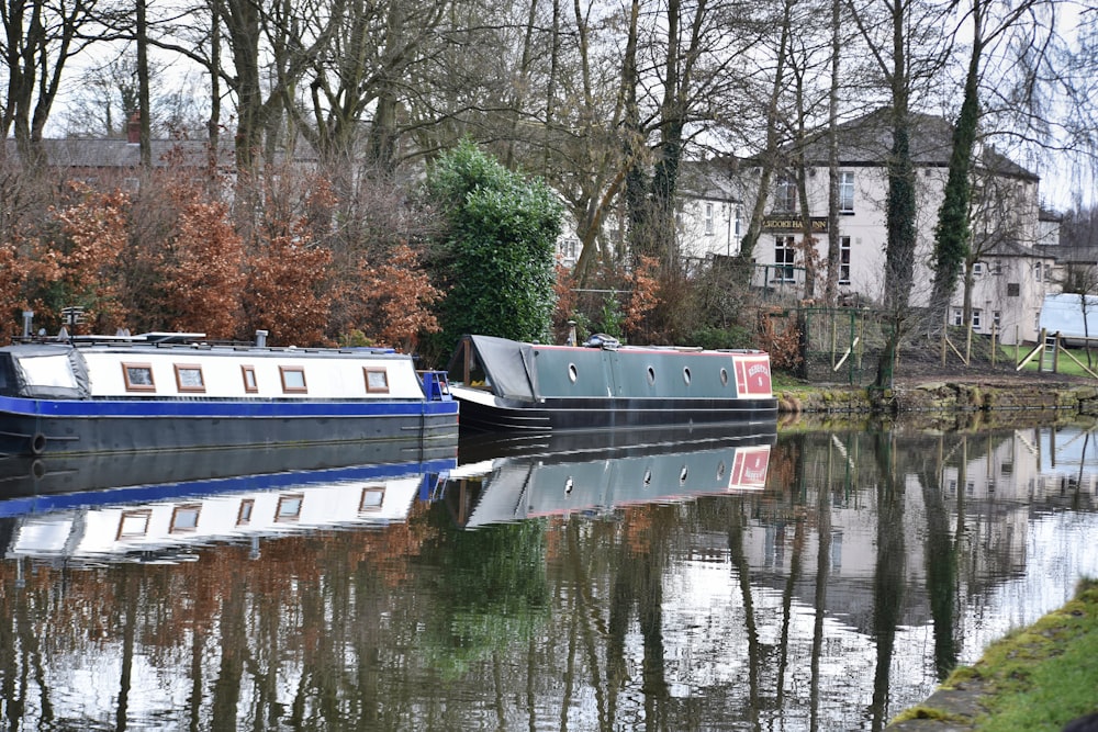 a couple of boats that are sitting in the water