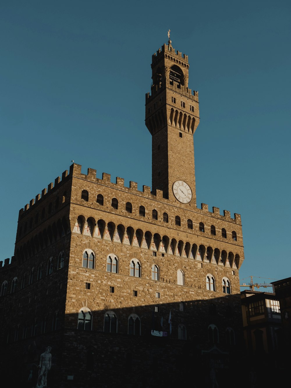 a large brick building with a clock tower