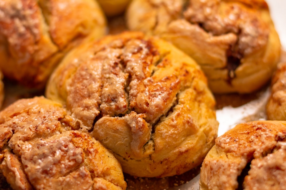 a close up of a bunch of pastries on a table