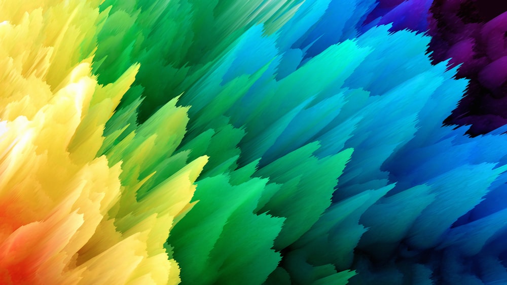a multicolored background of feathers of different colors