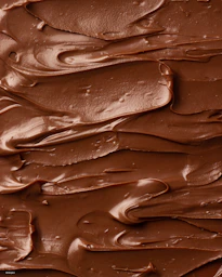 a close up of a cake with chocolate frosting