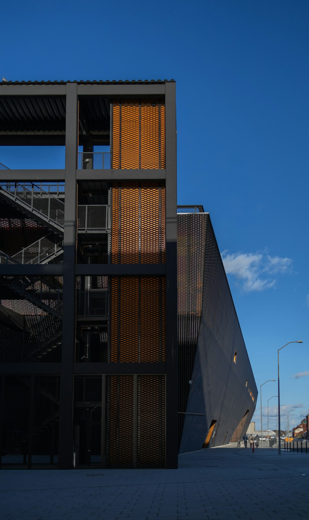 a tall building with a staircase next to it