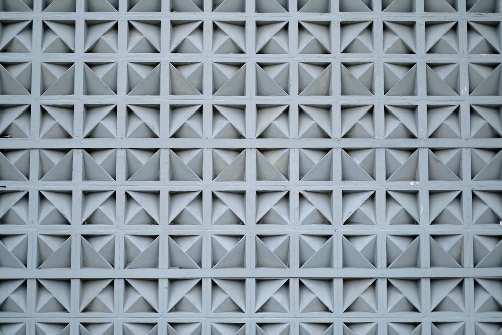 a close up of a wall with a pattern on it