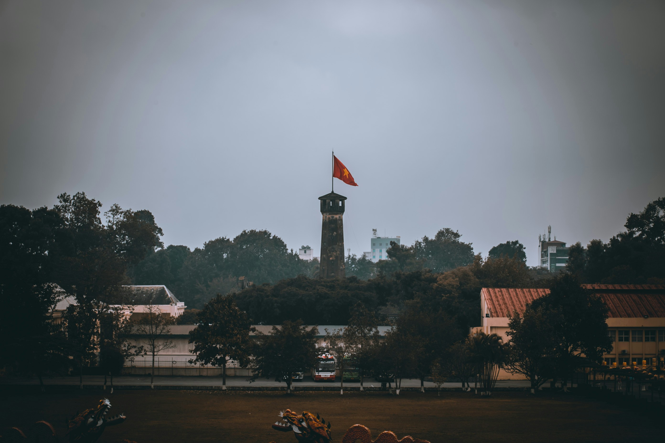 a large clock tower towering over a city