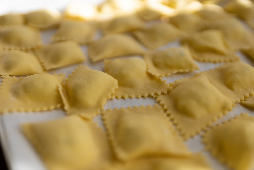 a close up of a plate of ravioli