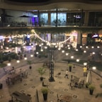 Outdoor courtyard with cozy seating and soft evening lighting.