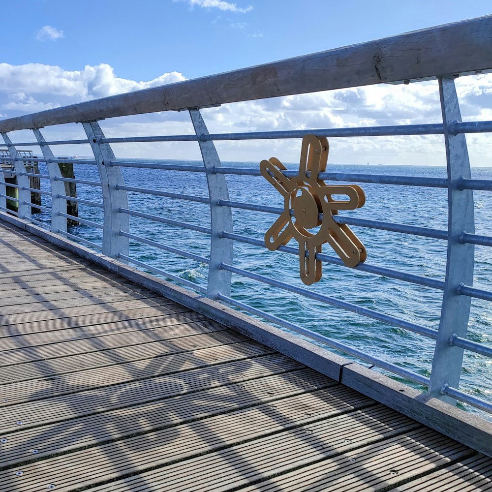 a wooden walkway over a body of water