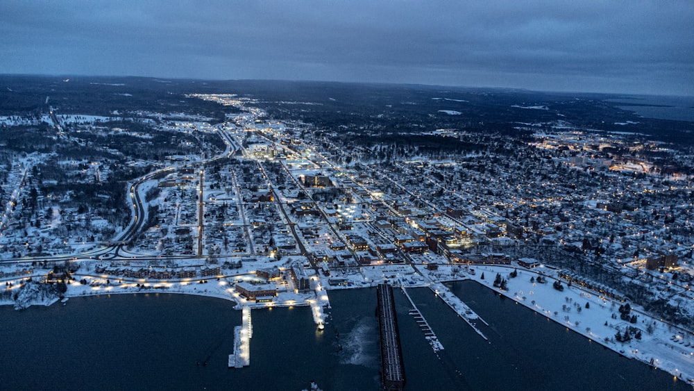 an aerial view of a city at night