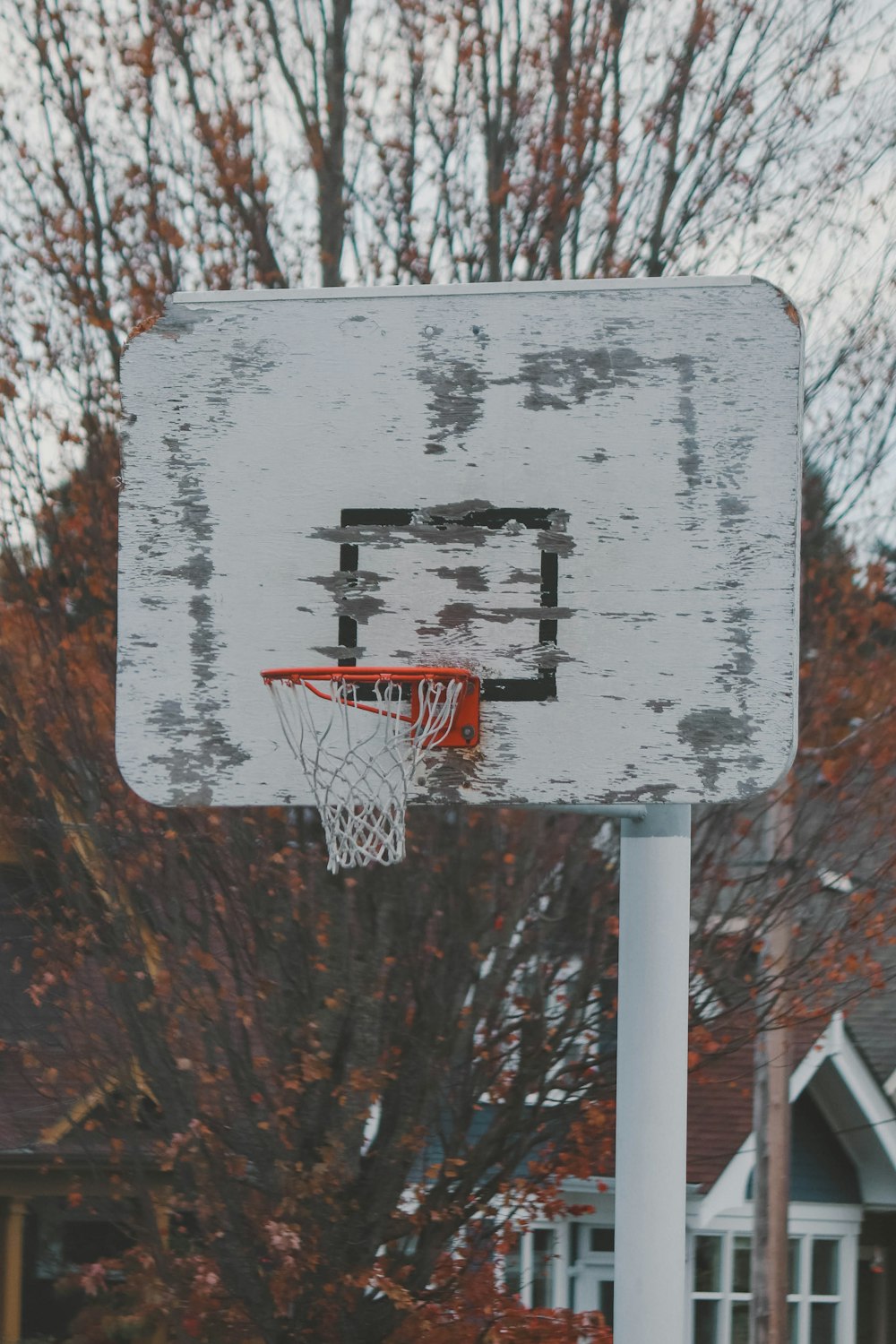 a basketball hoop with a basketball going through it