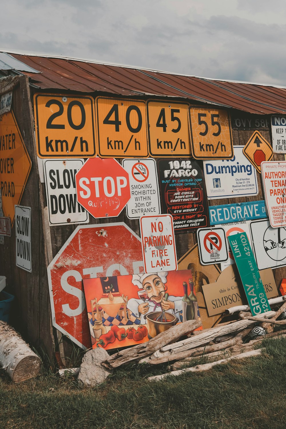 a bunch of street signs on a building