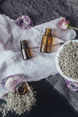 a table topped with bottles of essential oils