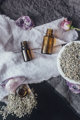 a table topped with bottles of essential oils