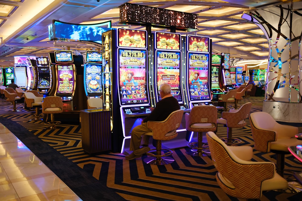 a casino room filled with lots of slot machines