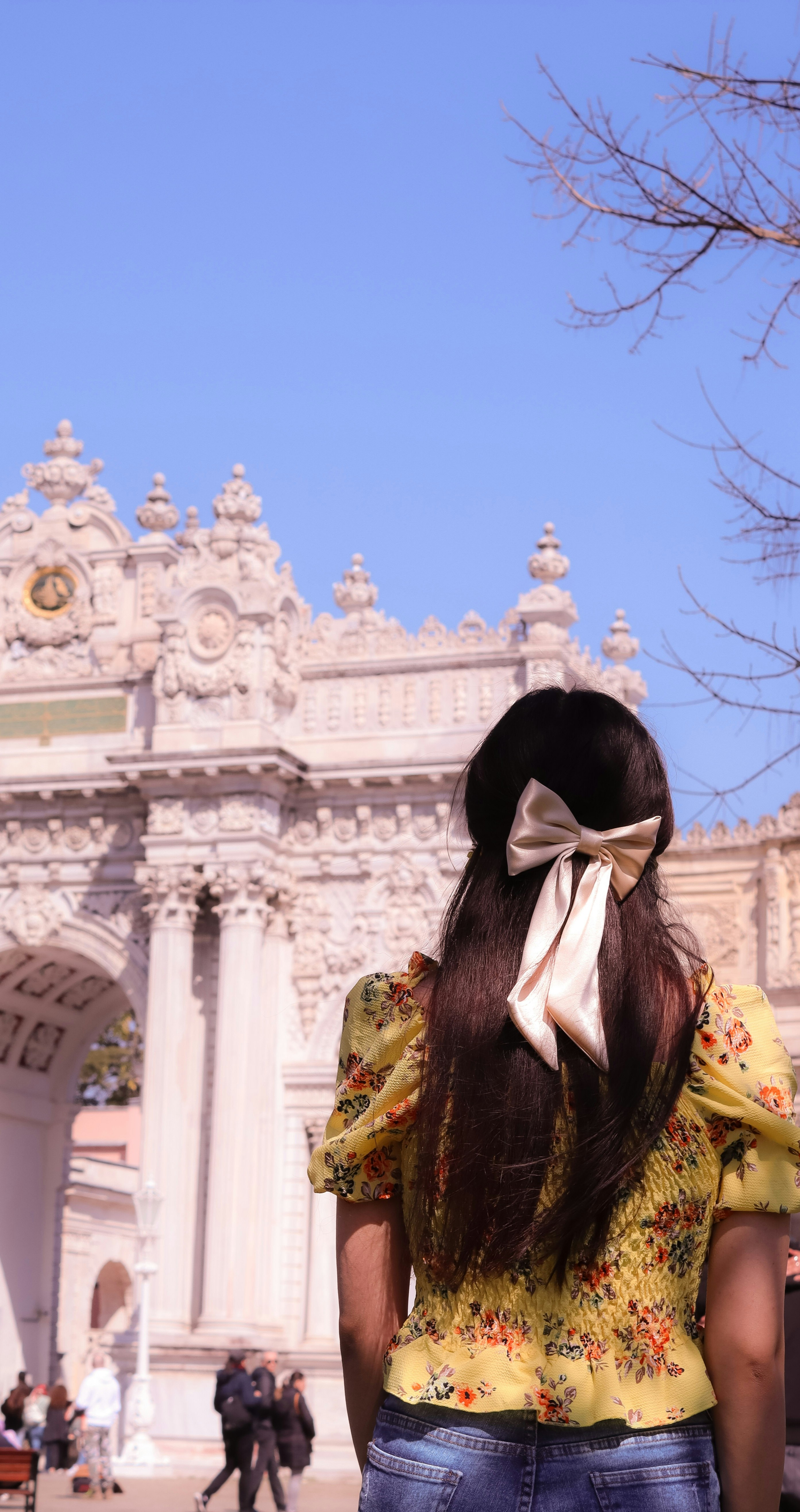 a woman with a bow in her hair