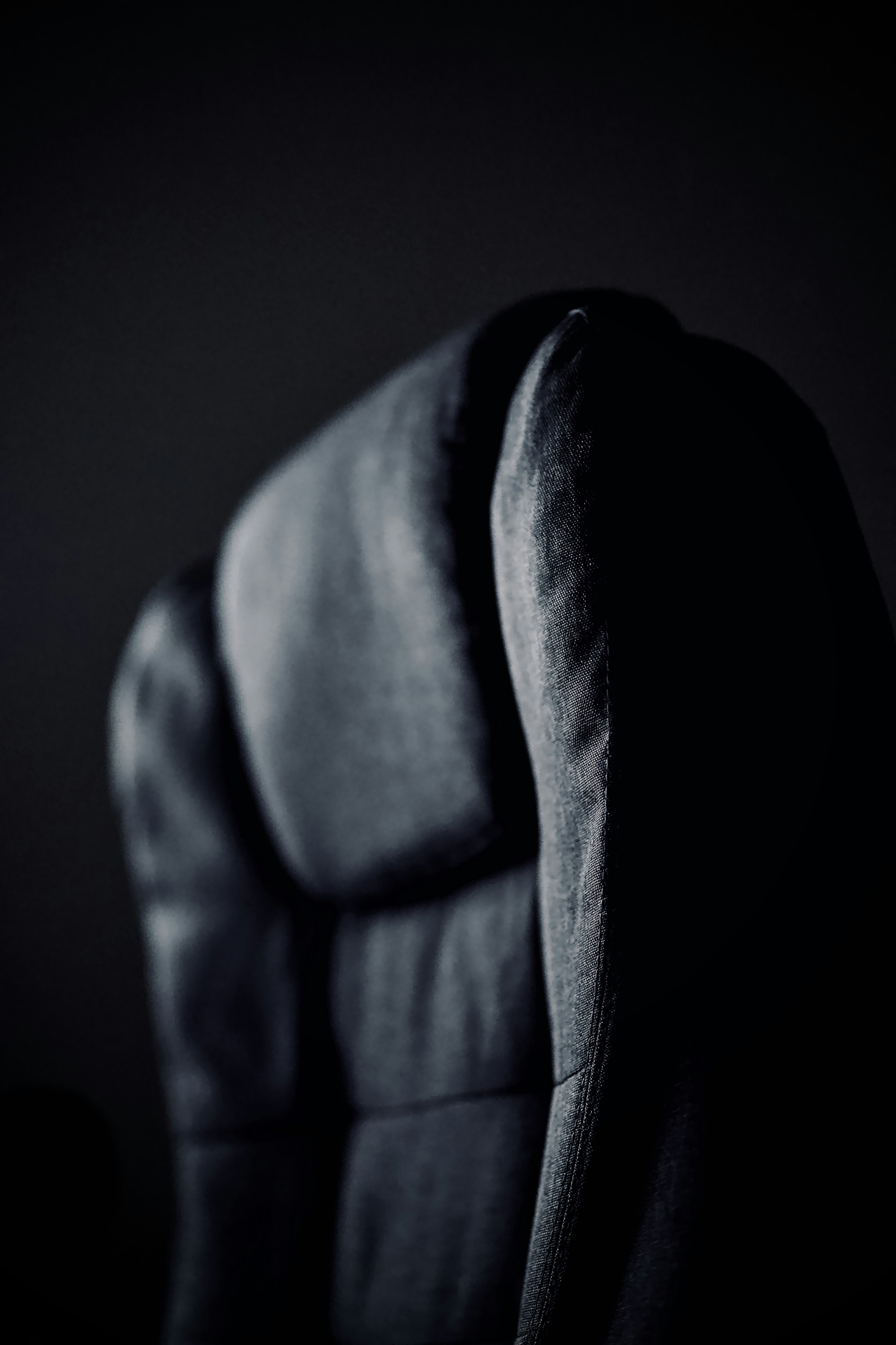 a black and white photo of a chair