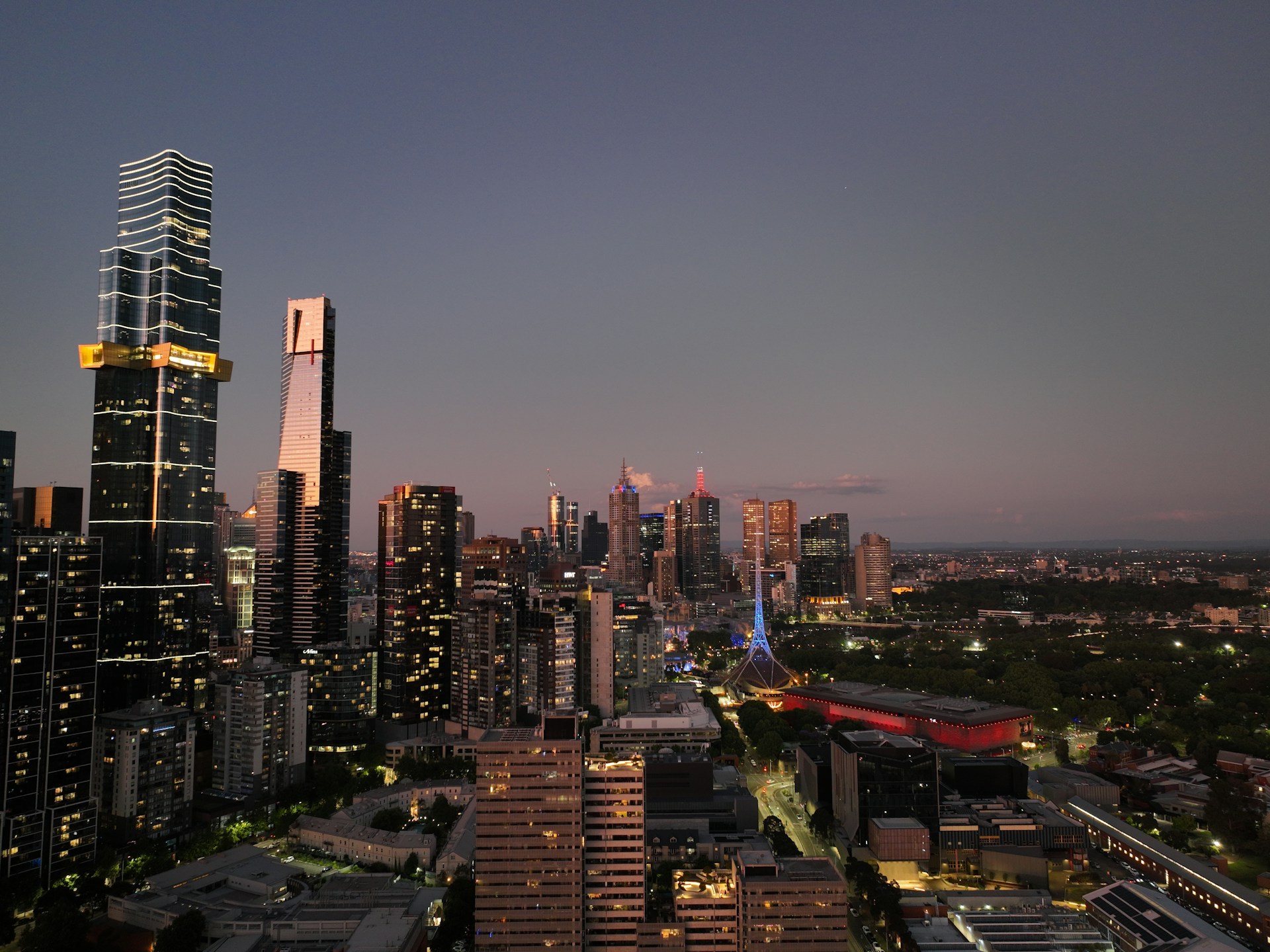 a view of a city at night from the top of a building