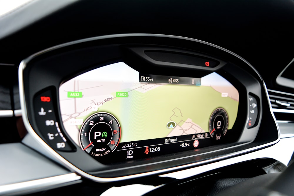 a view of a car's dashboard from the driver's seat