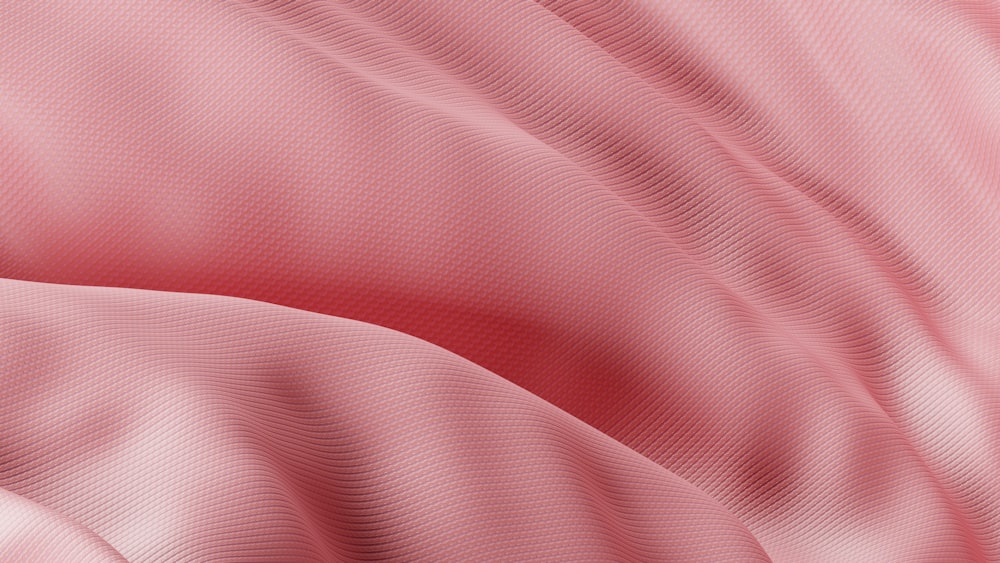 um close up de uma textura de tecido rosa