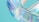 A digitally crafted, translucent swirl with iridescent colors reflecting a mix of blues, purples, and pinks on a pastel turquoise background. The material appears smooth and glossy, giving a sense of motion and fluidity.