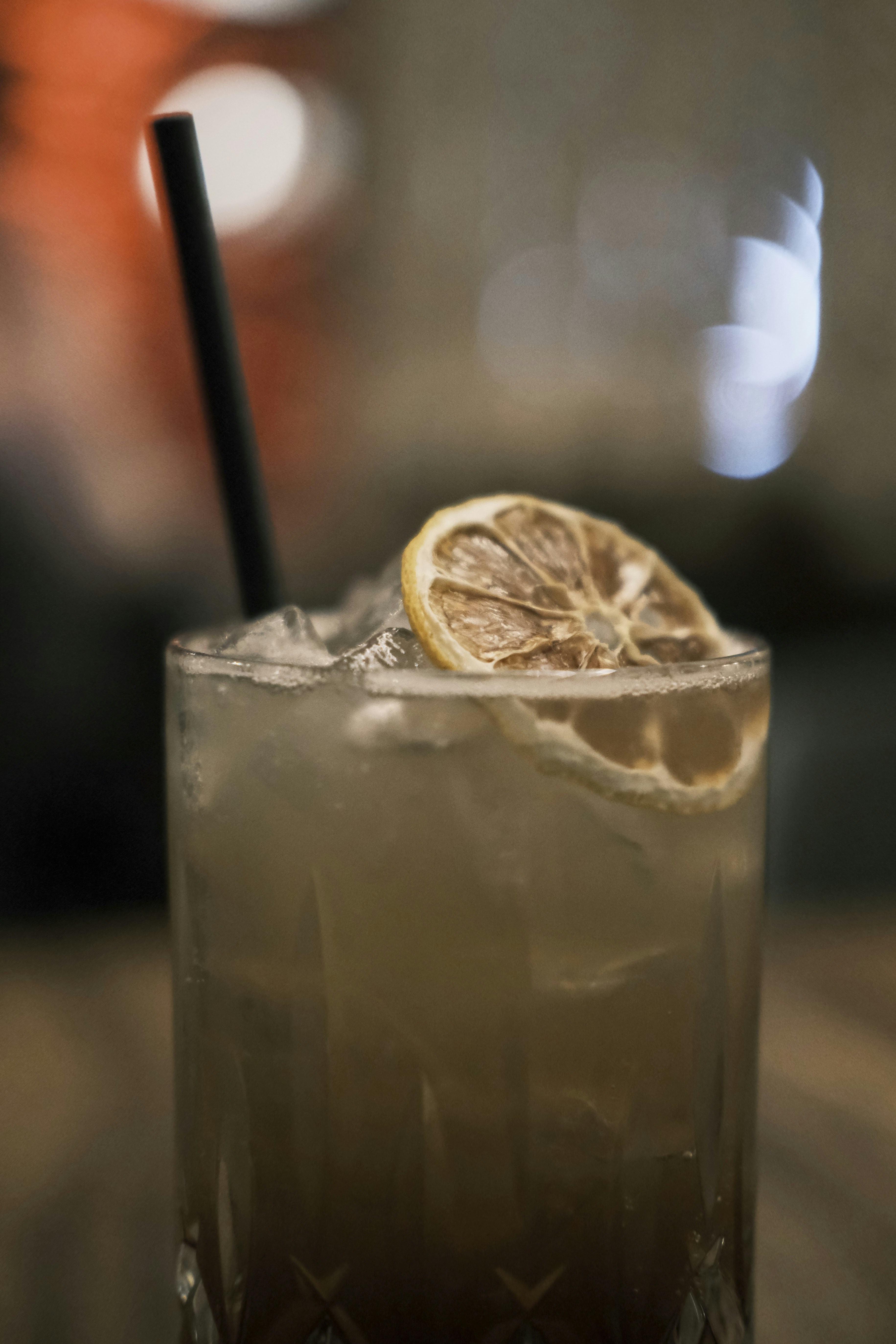woman wearing yellow long-sleeved dress under white clouds and blue sky during daytime
