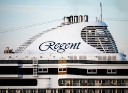 a large cruise ship with the word regent on it's side