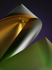 Abstract silver and gold shapes converging into a radiant core on black backdrop.