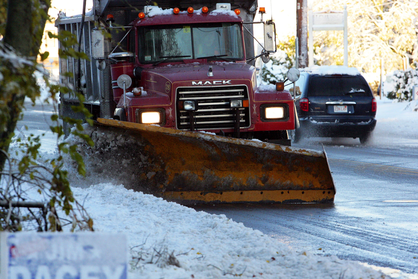 Snow plough clearing a road