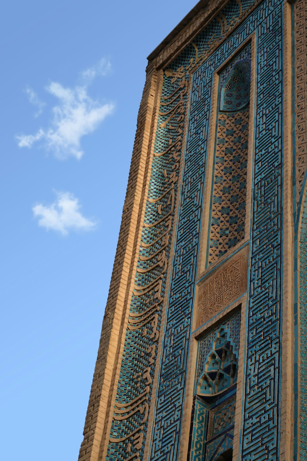 a tall building with a clock on the side of it