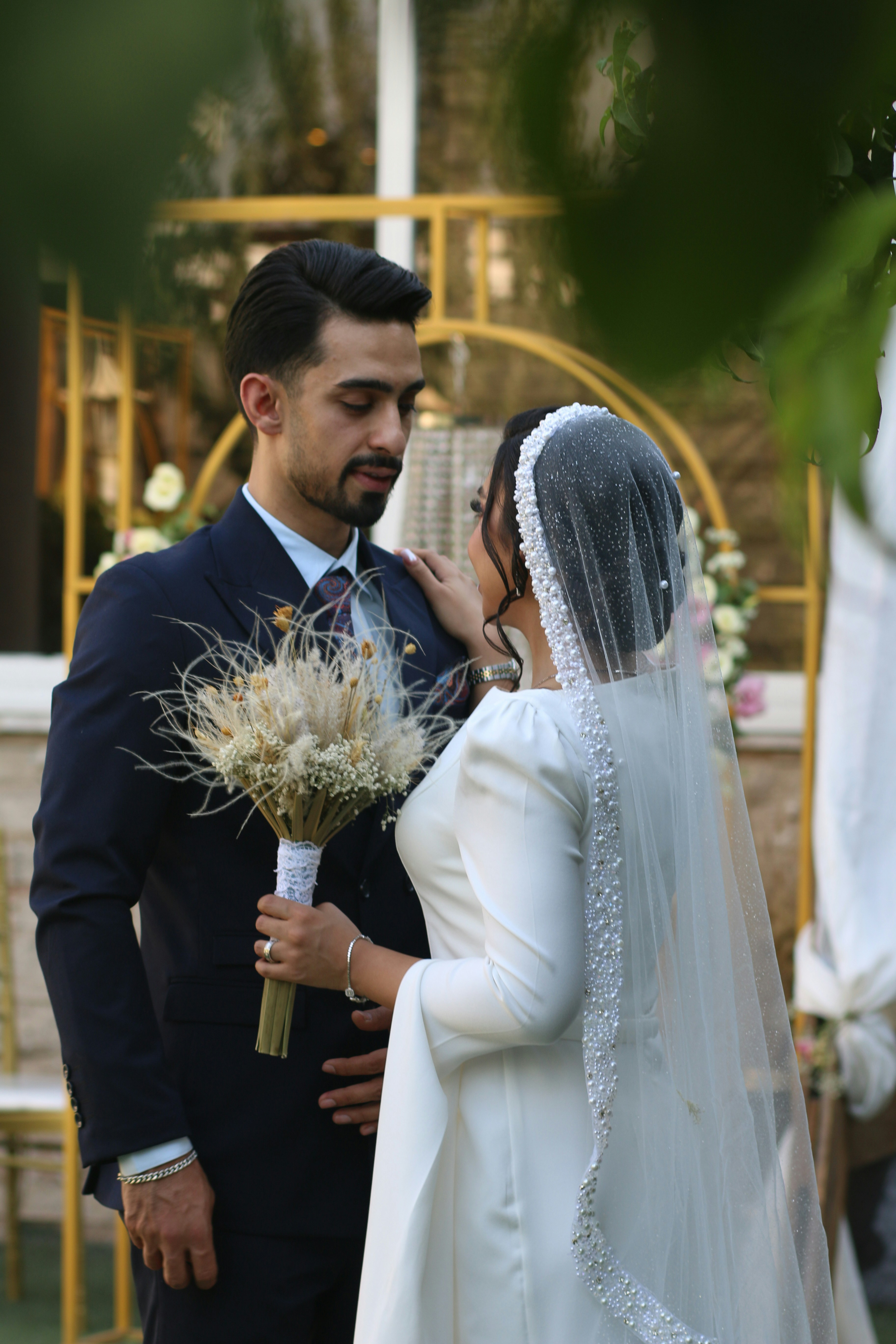 a man and a woman standing next to each other