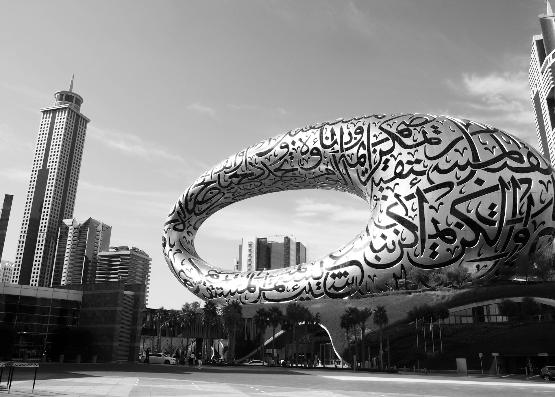 a large sculpture of a snake in the middle of a city