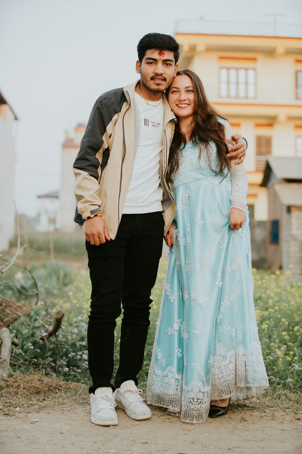 a man and a woman standing next to each other