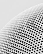 A close-up view of a geometric pattern consisting of black spherical nodes connected by thin lines, forming a lattice structure on a curved surface. The background is a light gray gradient.