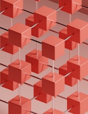 blockchain group of red cubes on a gray background