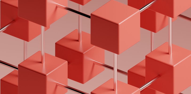 a group of red cubes on a gray background