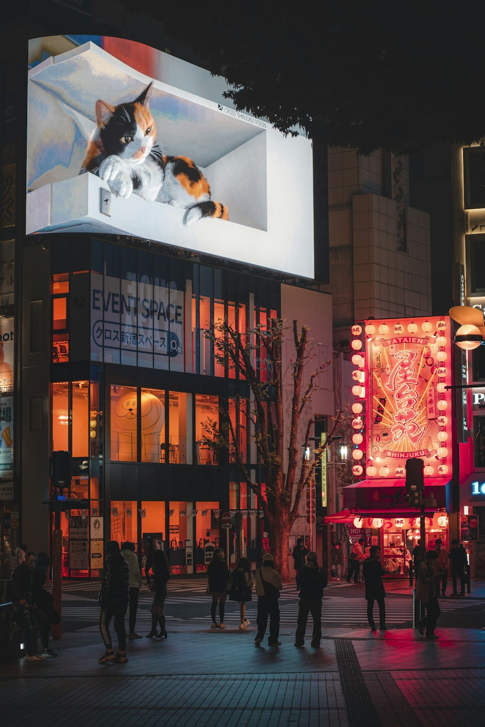 a group of people standing in front of a building