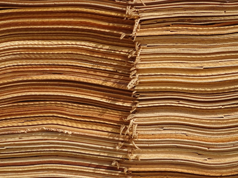 a large stack of papers stacked on top of each other