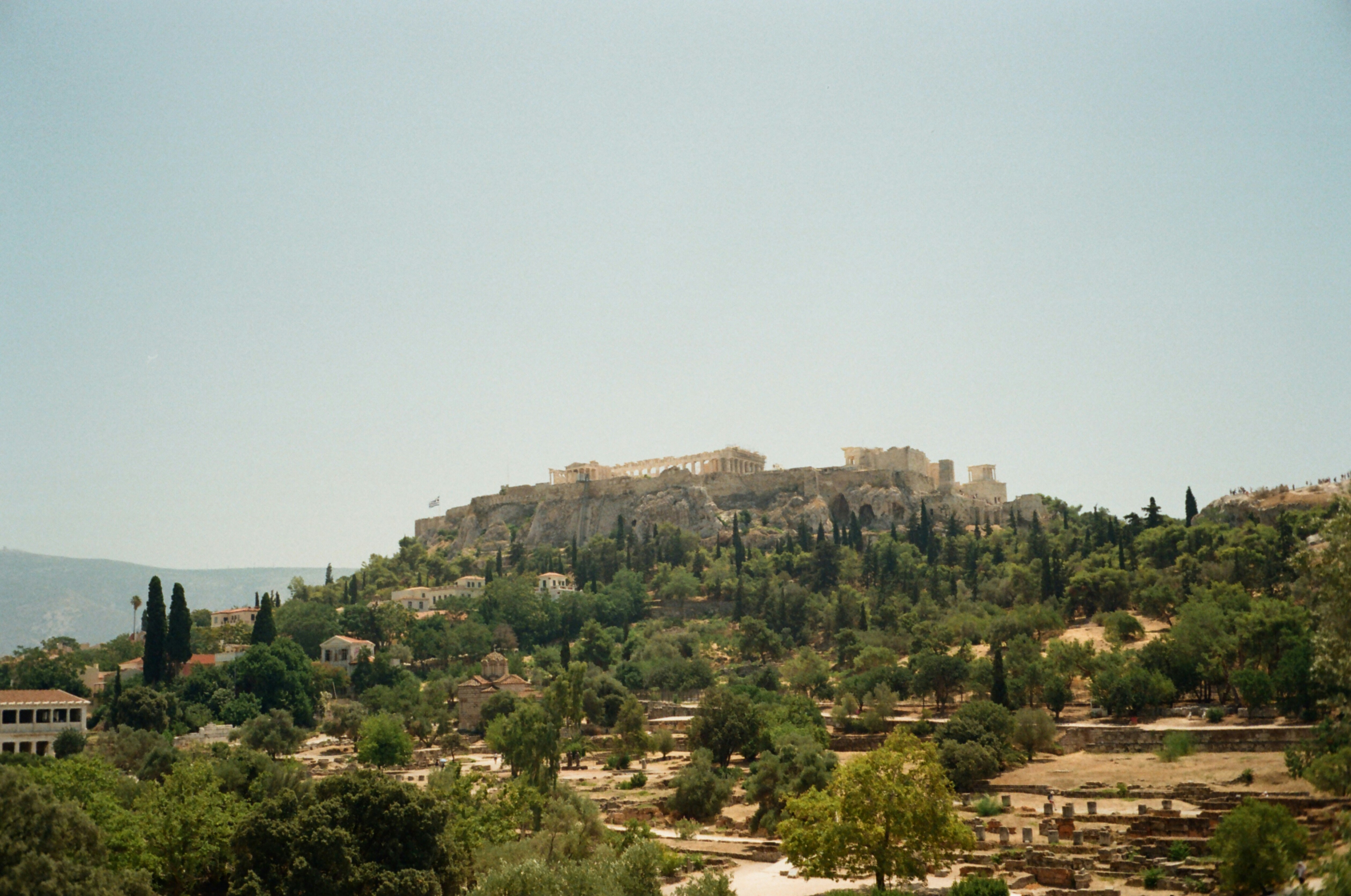 a hill with a castle on top of it