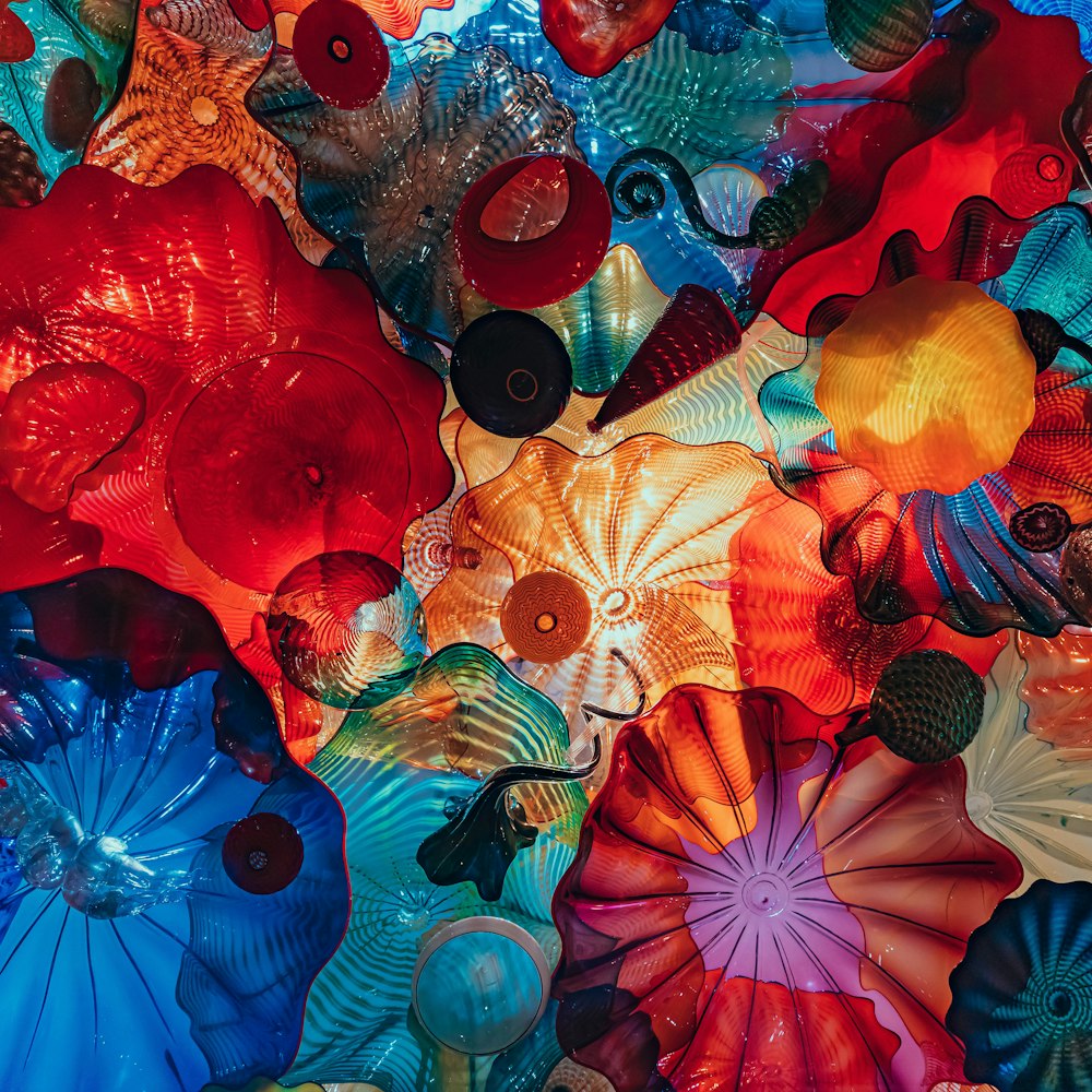 a close up of a bunch of colorful glass flowers