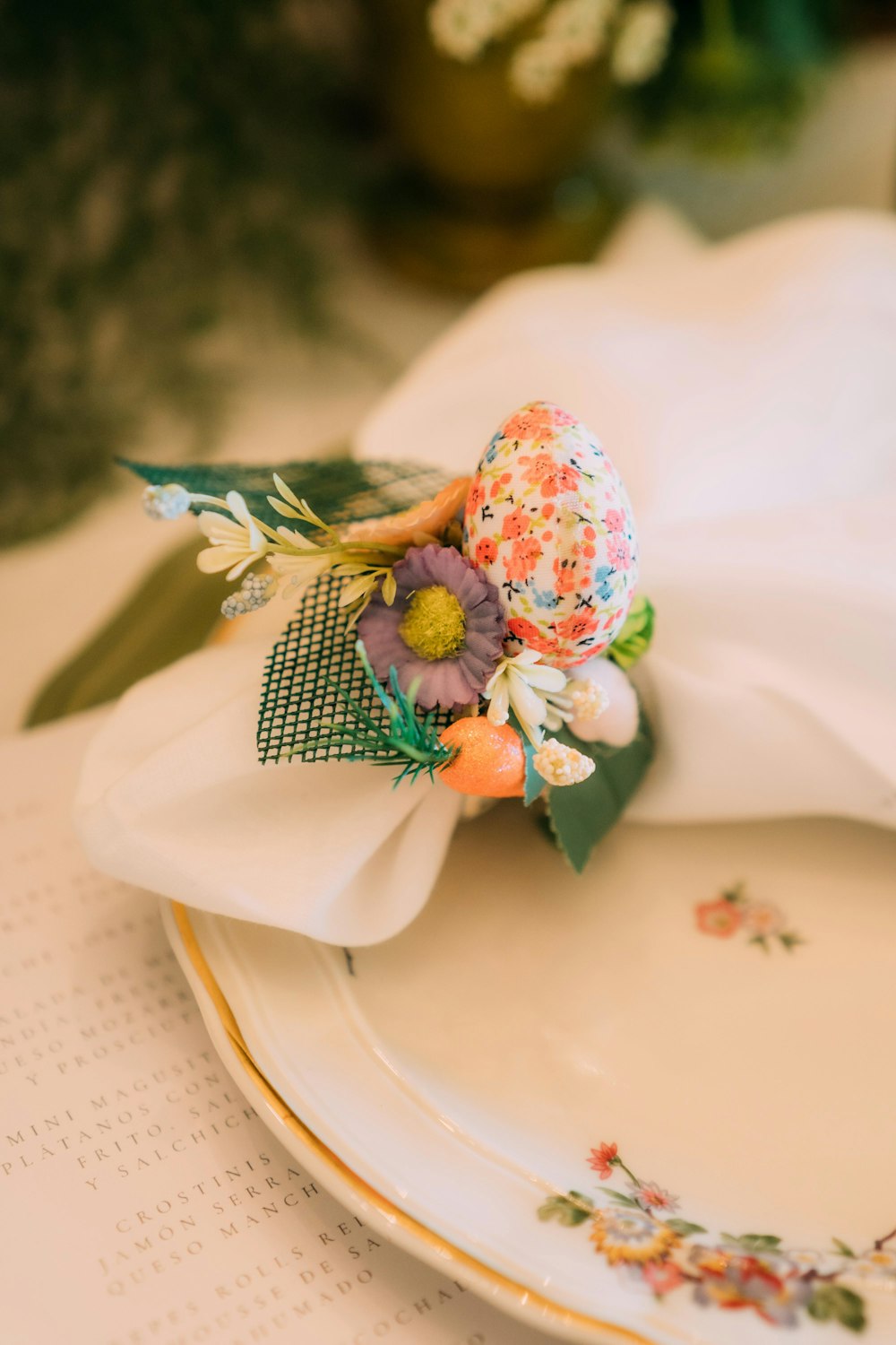 a close up of a plate with a napkin on it