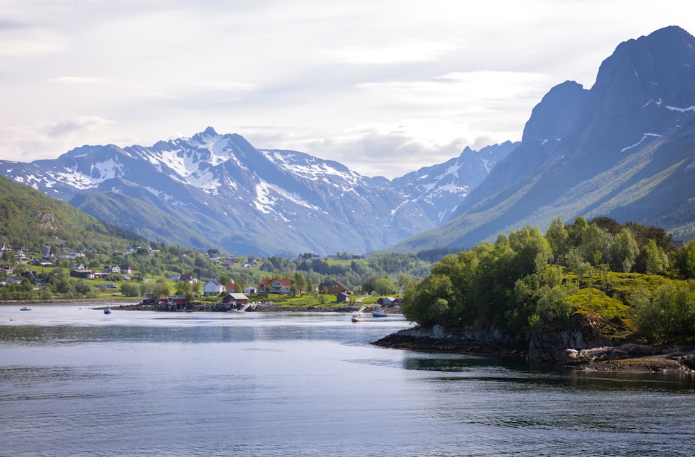 a river with mountains in the background