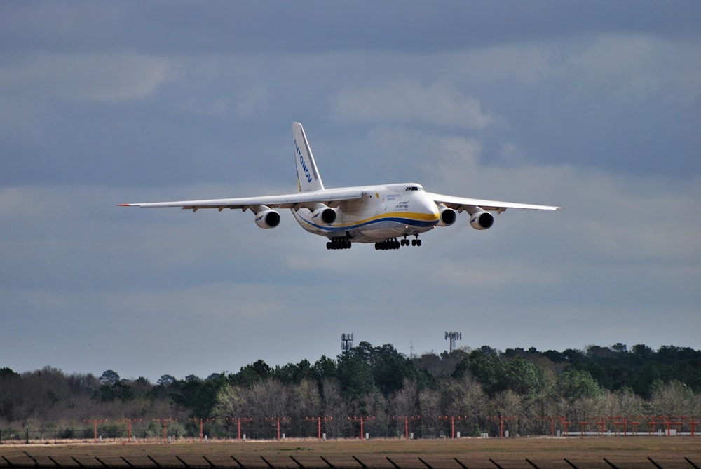 a large jetliner taking off from an airport runway