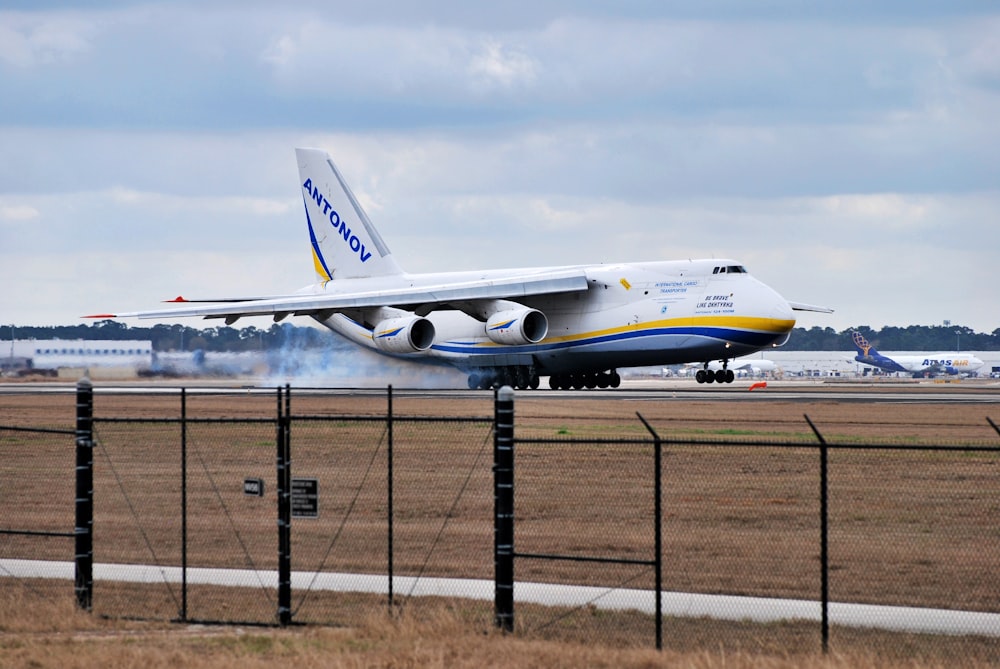 a large jetliner taking off from an airport runway