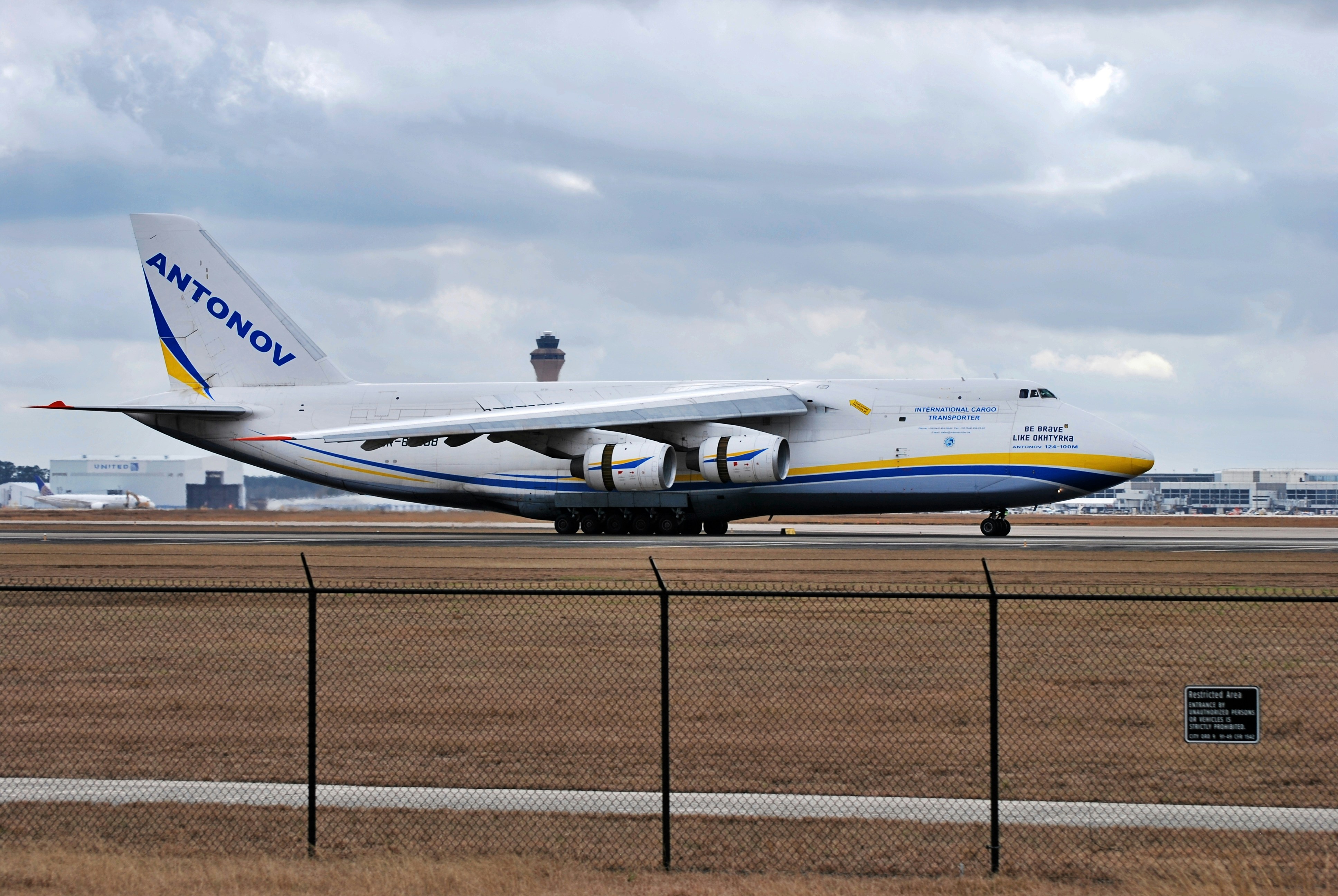 a large jetliner sitting on top of an airport runway, Antonov A124 PANC-KIAH | Anchorage to Houston