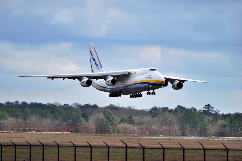 a large jetliner taking off from an airport runway