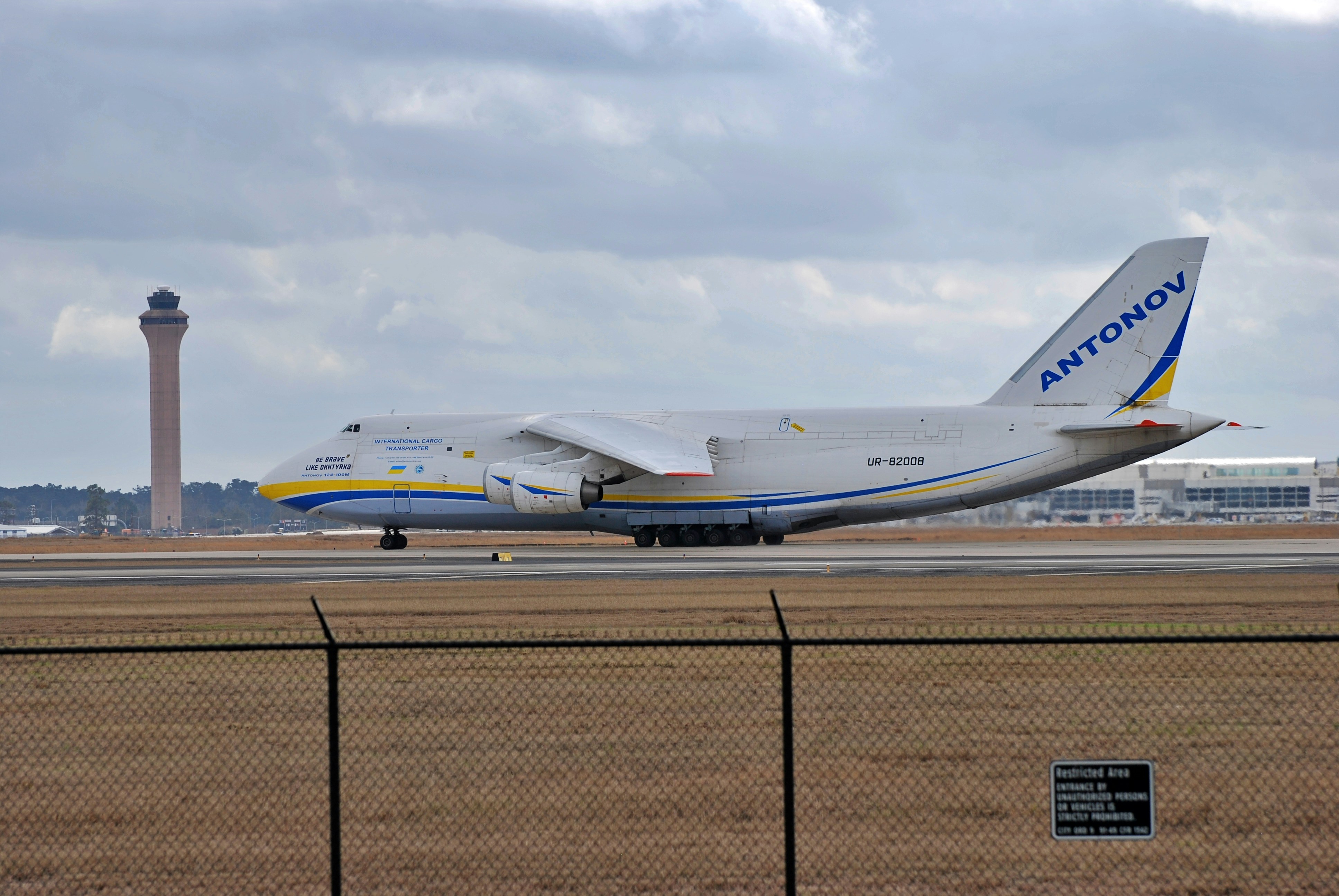 a large jetliner sitting on top of an airport runway, Antonov A124 PANC-KIAH | Anchorage to Houston