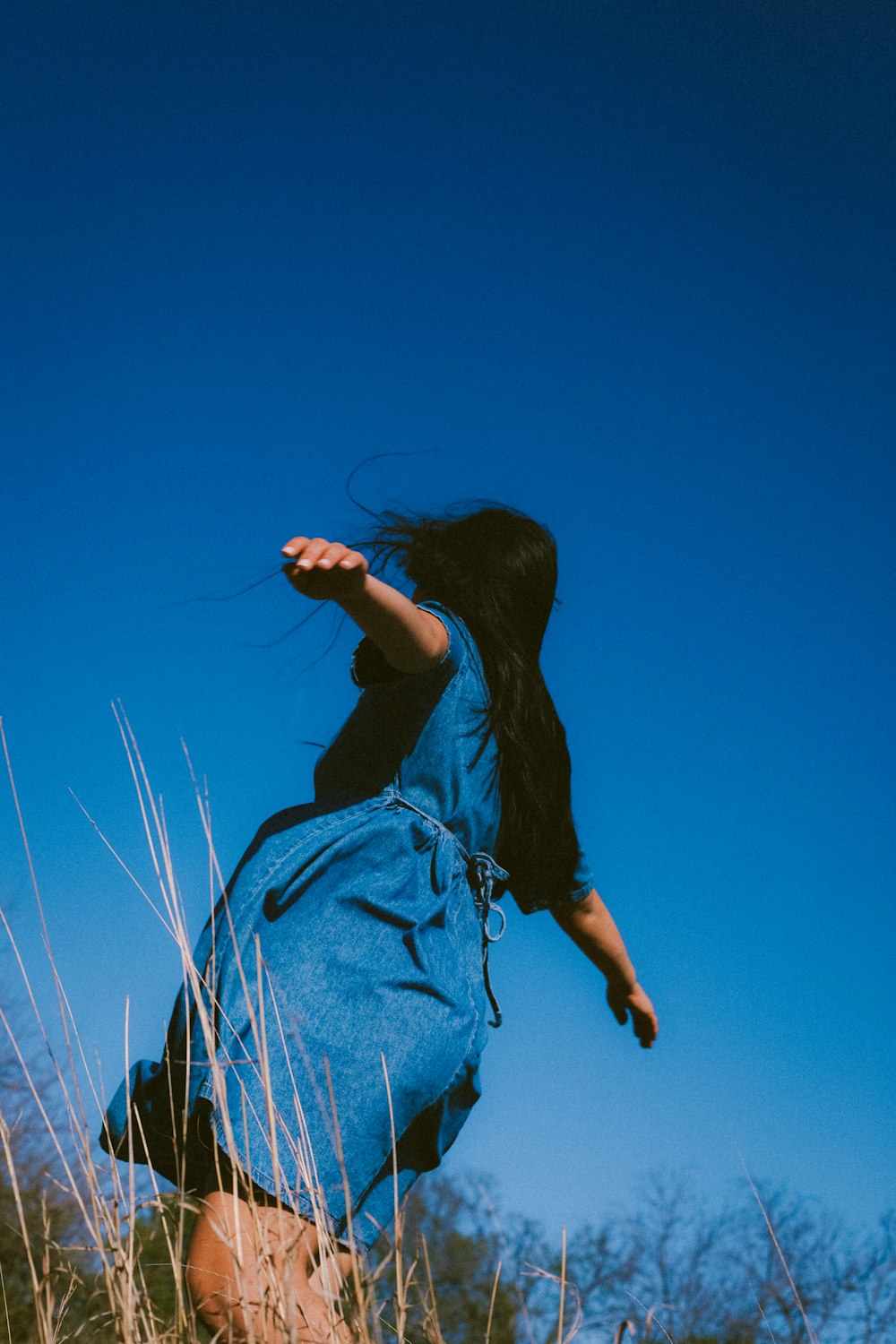 a person jumping in the air on a skateboard