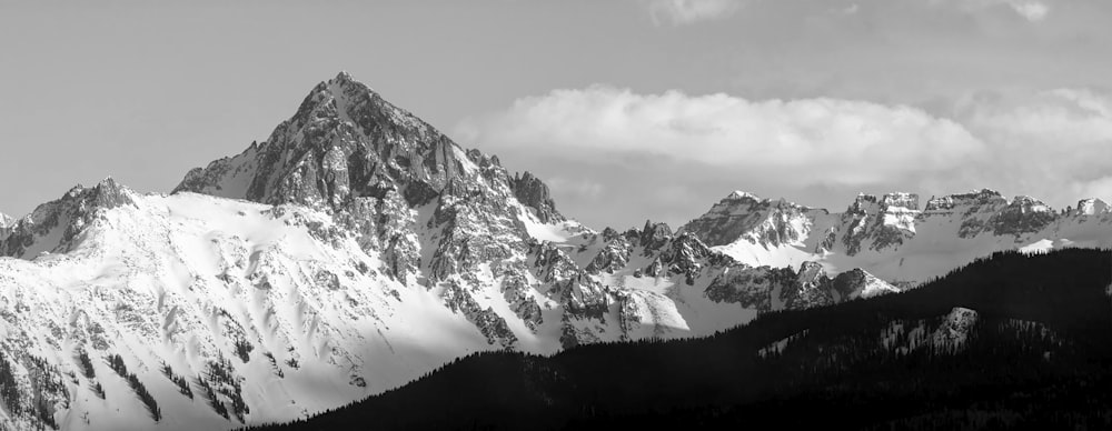 a black and white photo of a mountain range