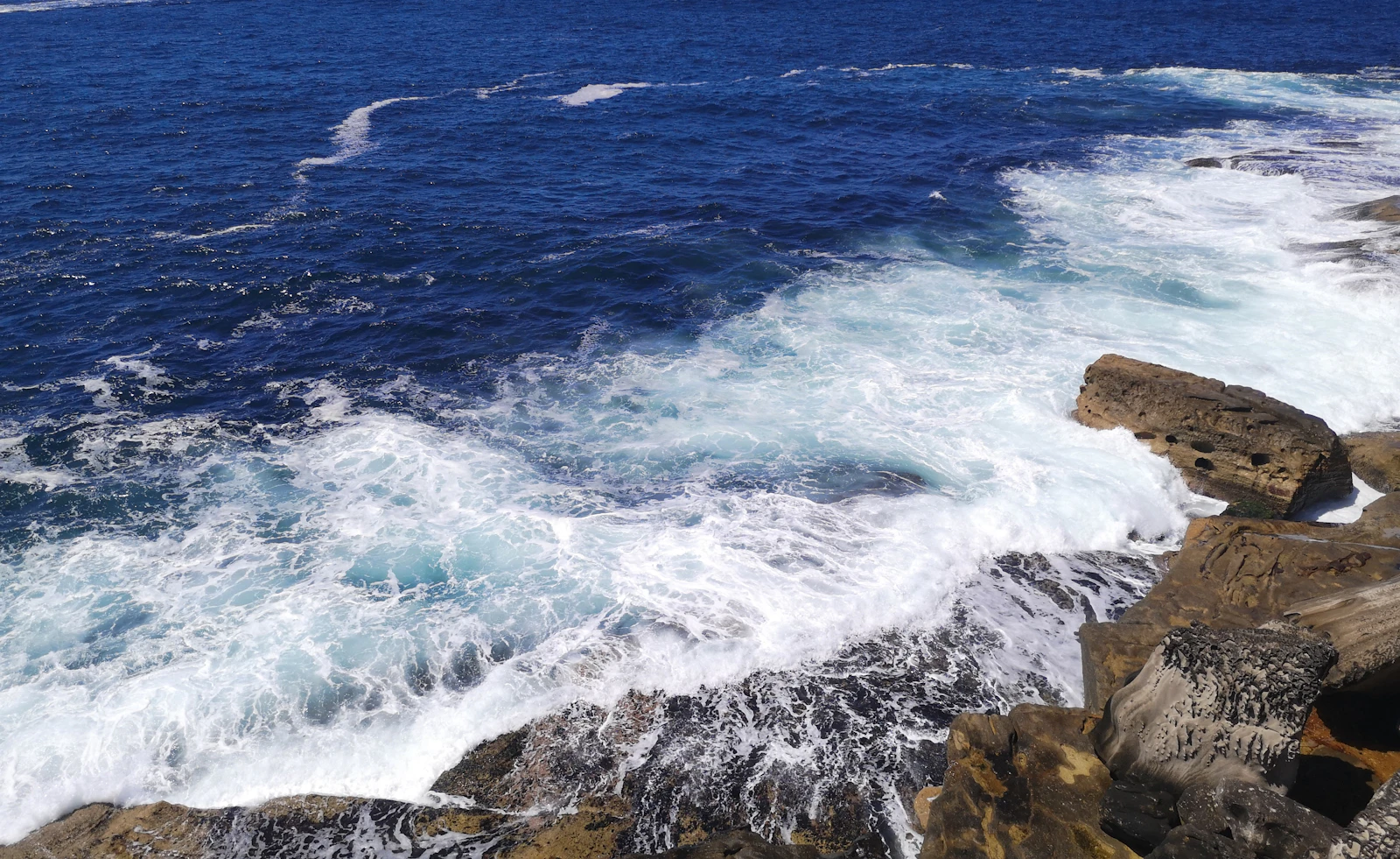 A view of the ocean from the dramatic sandstone cliffs at The Gap, Watsons Bay Sydney