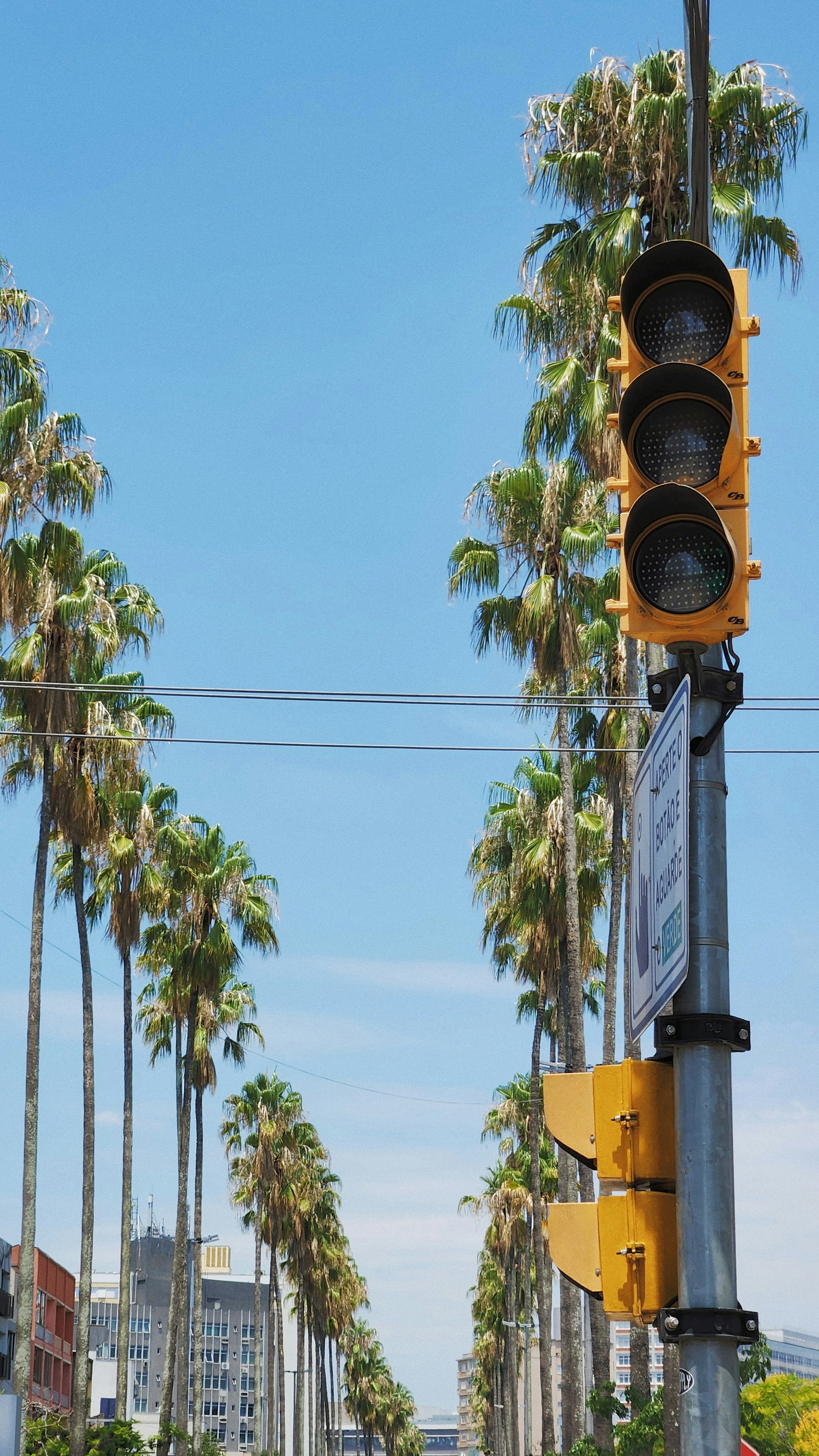 a traffic light sitting on the side of a road