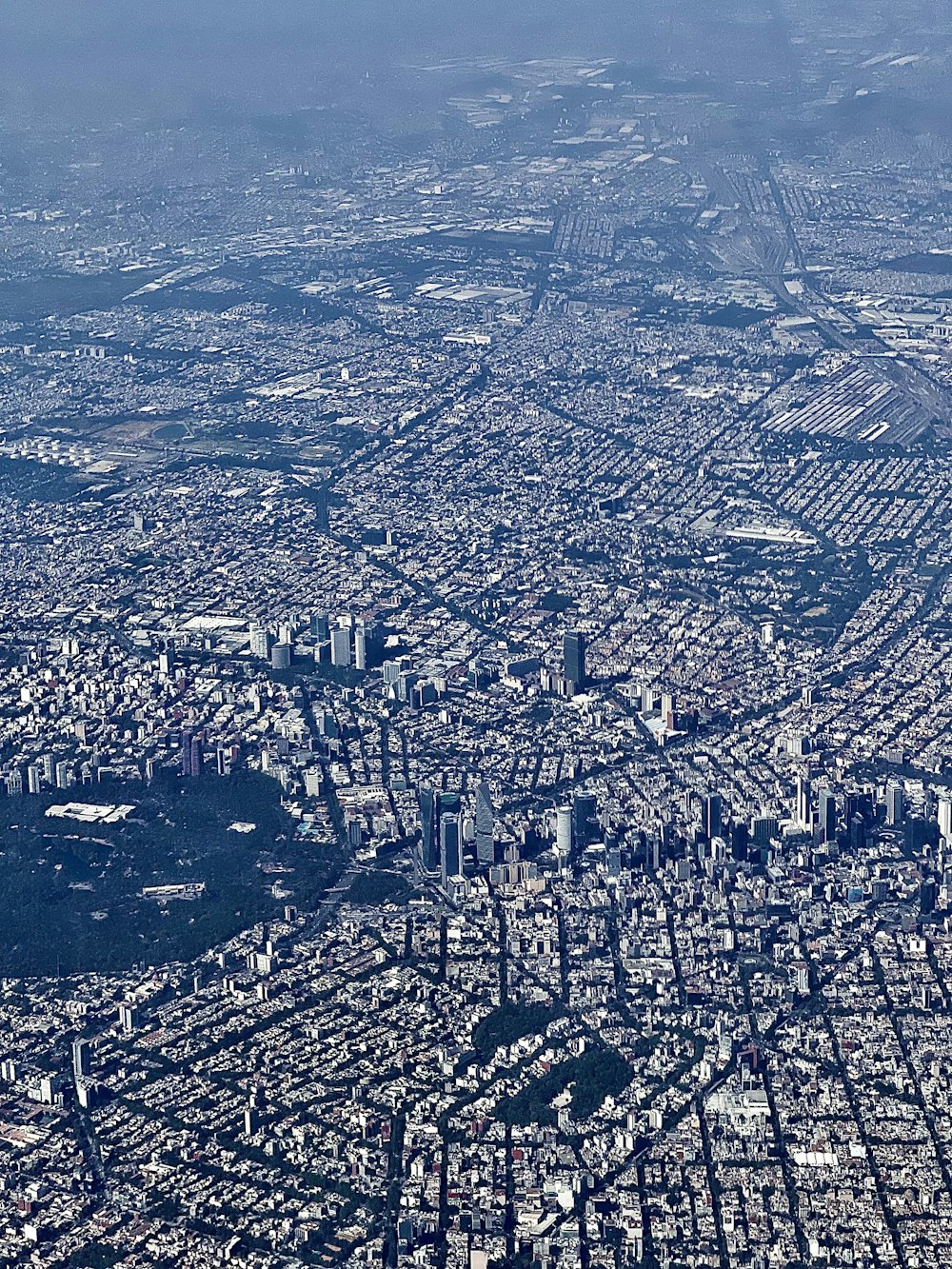 an aerial view of a city from an airplane